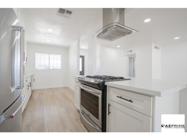 Building Photo - Welcome To This Remodeled 3/2 Midtown Phoe...