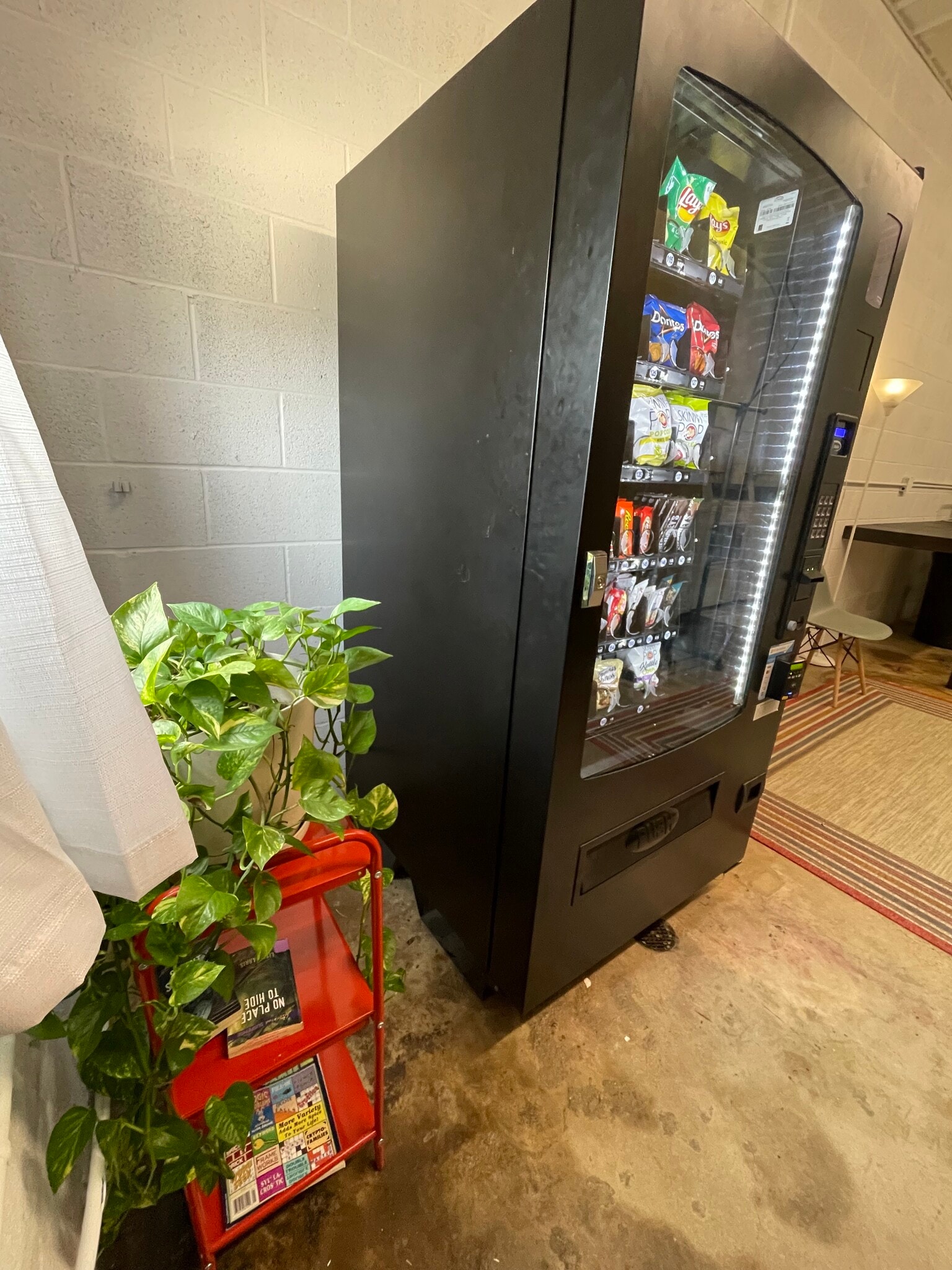 Snack machine in laundry mat. - 475 S Hickory St