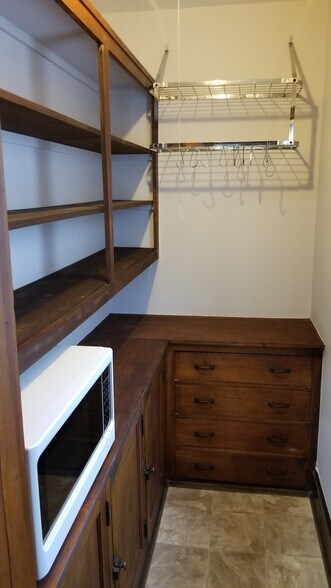 HUGE walk in pantry. Microwave included if desired. - 1522 E Marion St