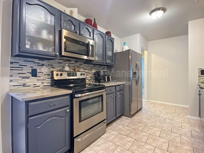 Building Photo - 9609 Woodland Hills