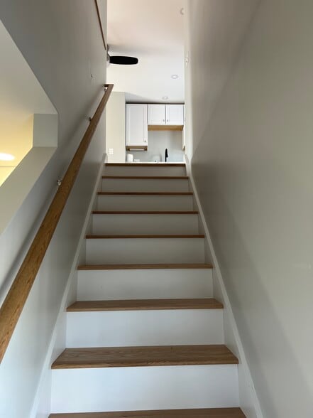 Stairs in the entryway leading up to the unit - 16 Perkins St