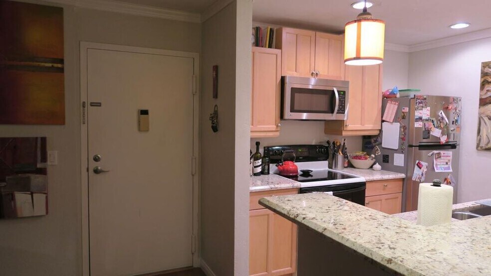 Stainless stell appliances, recessed lights, granite countertops & pendant lights - 6111 Rancho Mission Rd