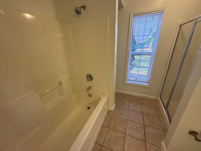 Building Photo - Adorable 1 Bed 1.5 Bath Condo in Brier Creek! 1st Floor! Sun Room! New Appliances!