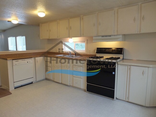 Building Photo - Spacious 2 Bedroom Home with Wood Stove in...