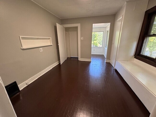 Building Photo - Classic 1928 Goodyear Heights charmer—fireplace, yard & off-street parking