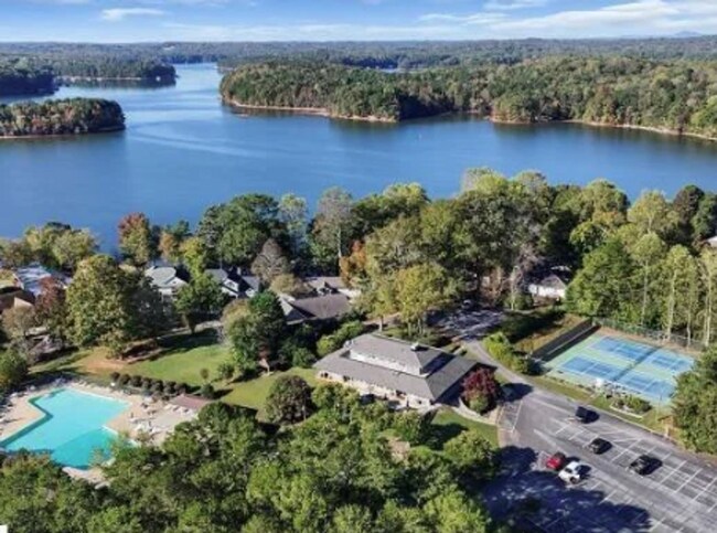 Building Photo - Beautiful and Spacious! Upgraded Multi-level Retreat with Lake Access, Golf, and Resort- Style Am...