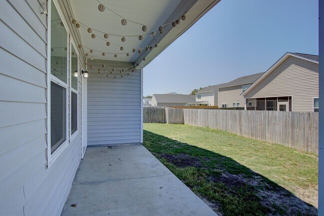 Building Photo - Spacious 4BR Rental with Stunning Kitchen & Covered Patio