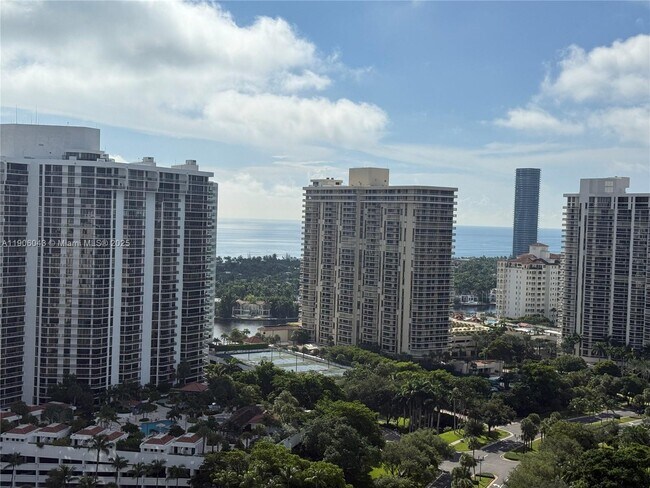 Building Photo - 3675 N Country Club Dr