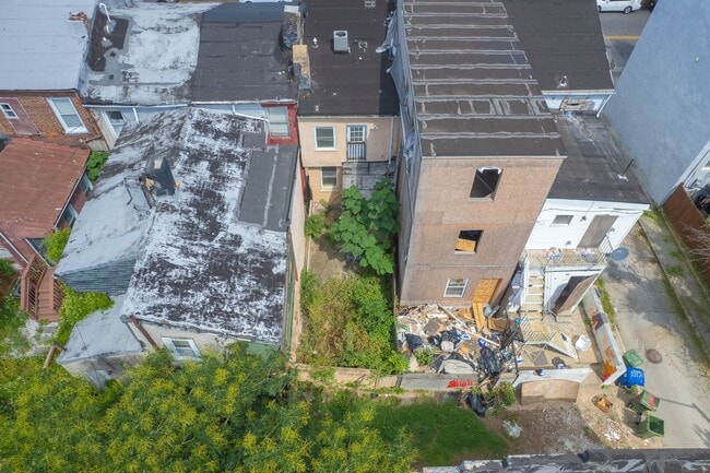 Building Photo - Spacious 2BR/2.5BA Townhome with Finished Basement & Extra Storage