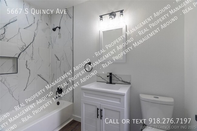 Building Photo - 5667 S Quincy Ave