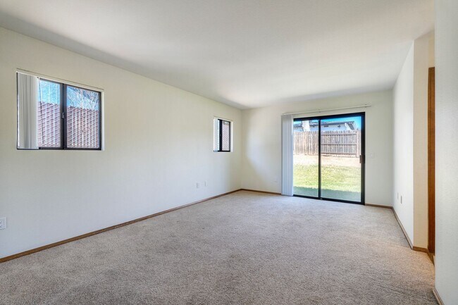 Building Photo - Corner Lot 4BR with Vaulted Ceilings & Big Yard