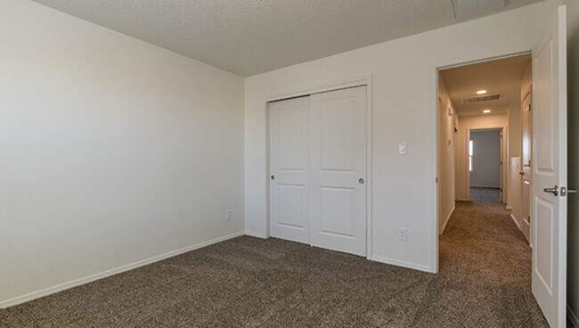 Building Photo - New ST FE Town Home