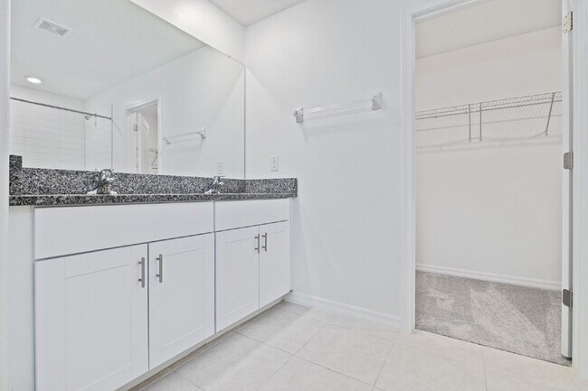 Building Photo - "Spacious 5-Bed Gem in Epperson community ...