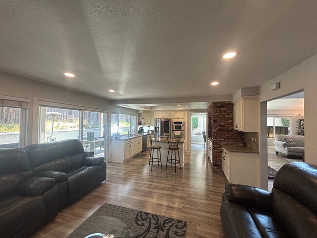 Building Photo - Upgraded 4-Bedroom Home in Gated Green Riv...