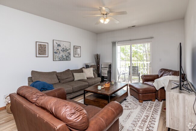 3BR, 2BA - 1,125SF - Living Room - 1209 Mayfield Dr