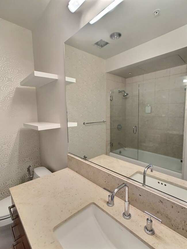 Building Photo - Stunning 2 Bedroom Penthouse Condo with Sp...