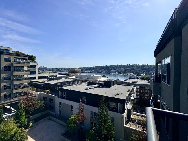 Building Photo - Top-Floor Corner 2BR with Lake Union Views + Garage Parking Included!