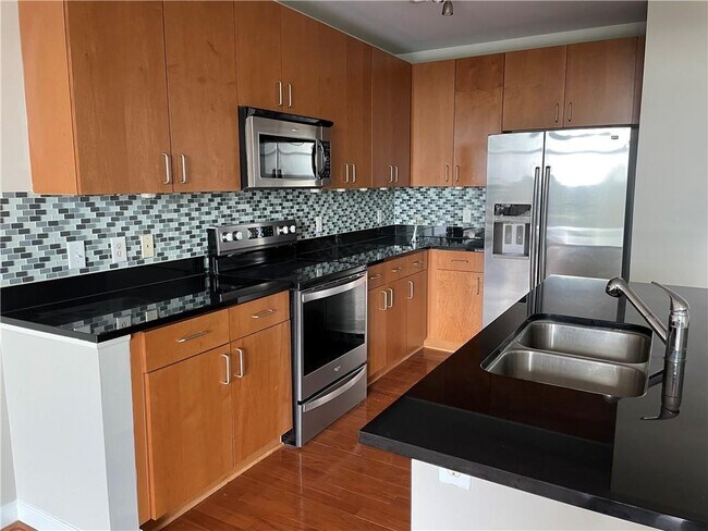 Building Photo - 711 Cosmopolitan Dr NE