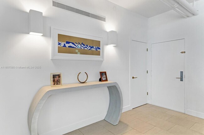 Building Photo - 10205 Collins Ave