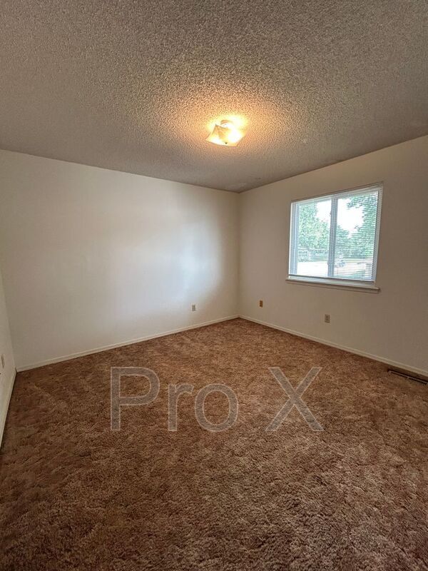 Building Photo - 1108 S Joplin St