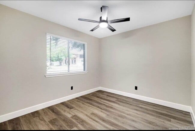 Building Photo - "Charming 4-Bedroom Home with Elegant Gran...