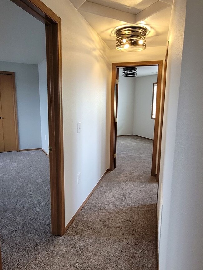 Building Photo - August Rent FREE - 4 Bedroom / Triple Car Garage