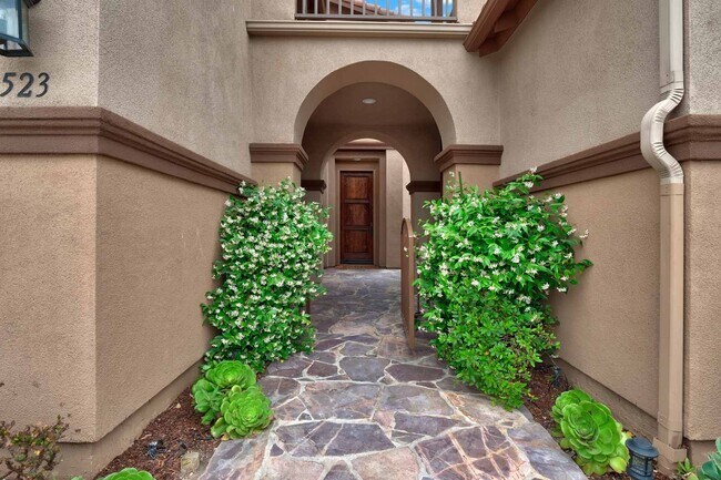 Building Photo - Gated corner lot home walking distance to the beach