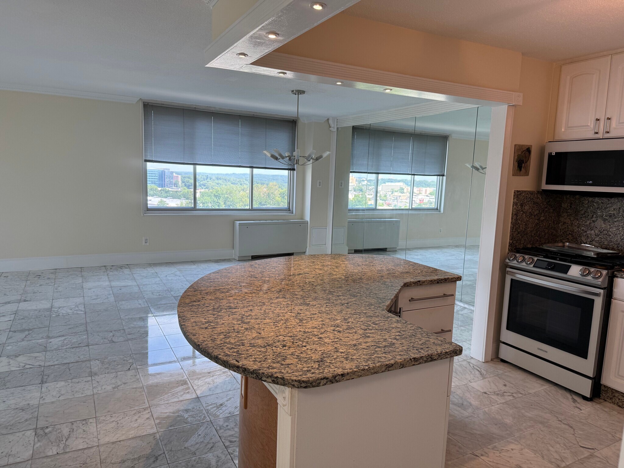 Kitchen granite counter opens to Living & dining - 11801 Rockville Pike
