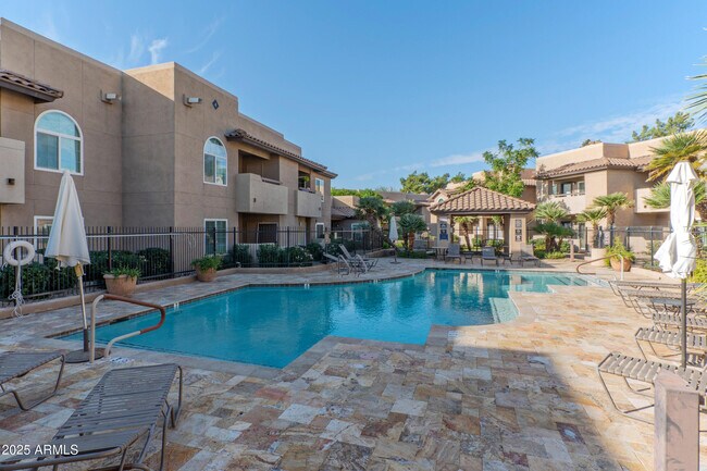 Building Photo - 9450 E Becker Ln