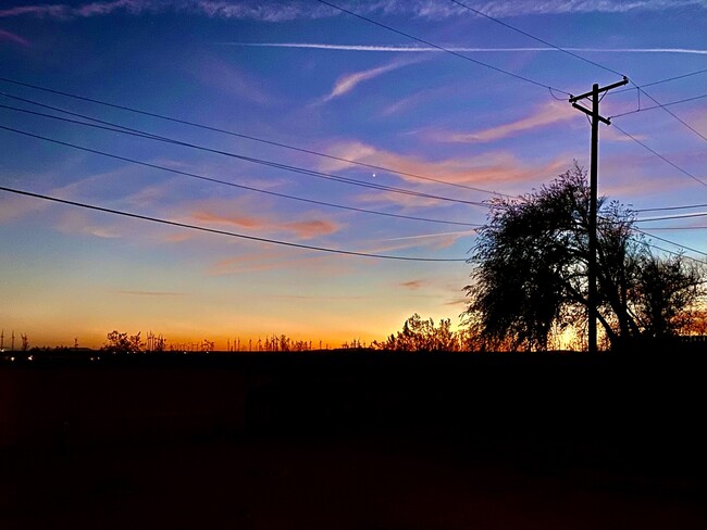 Absolutely beautiful sunsets over large backyard - 15875 Lawrence Dr