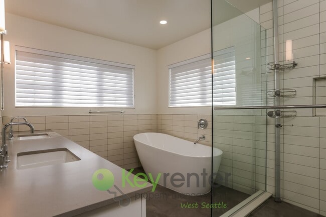 Building Photo - Spacious Living with Balconies, Deck, and Private Yard