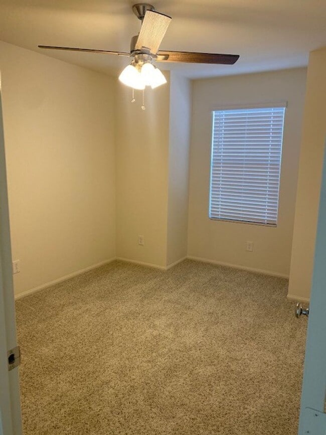 Building Photo - Beautiful Townhome in a Gated Community with 2-Car Garage!!