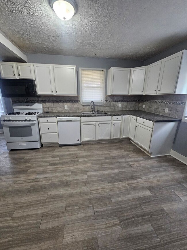 Building Photo - There is a $25 fee per application and everyone over 18 needs to fill out their own application.