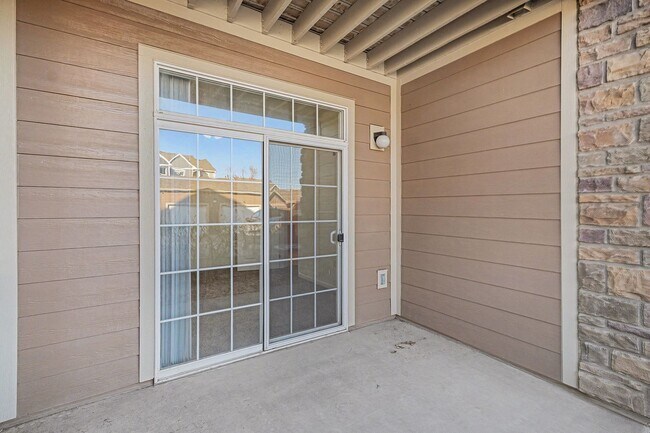 Building Photo - Bright 2-Bedroom Condo with Private Patio & Resort-Style Amenities!