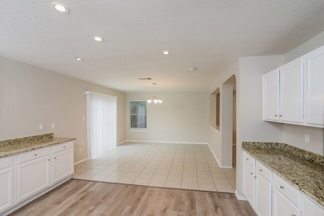 Building Photo - 10711 Amble Coach