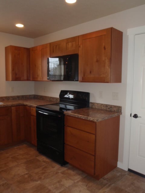 Building Photo - Newer house with attached garage. Half mon...