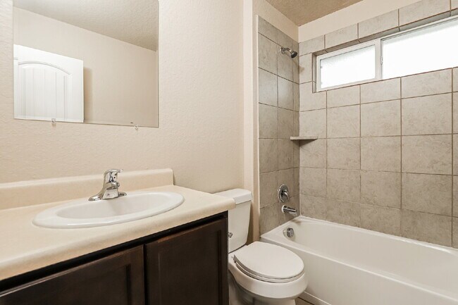 Building Photo - "Charming 4-Bed Sanctuary on Live Oak Pass with Modern Granite Finishes!"