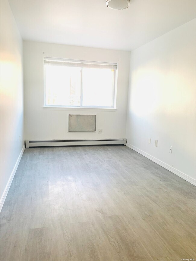 Building Photo - 22-15 119th St