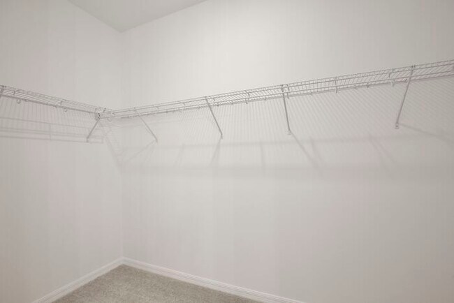 Building Photo - Stylish Sunbrooke Sanctuary! Modern 4/2 Home with High Ceilings, Designer Kitchen & Resort Amenities