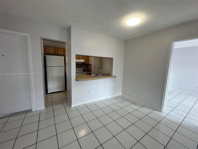Building Photo - 9808 Hammocks Blvd