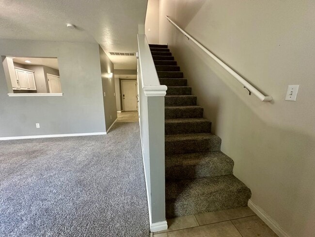 Building Photo - 2-Bedroom Townhome with Central AC and Covered Parking