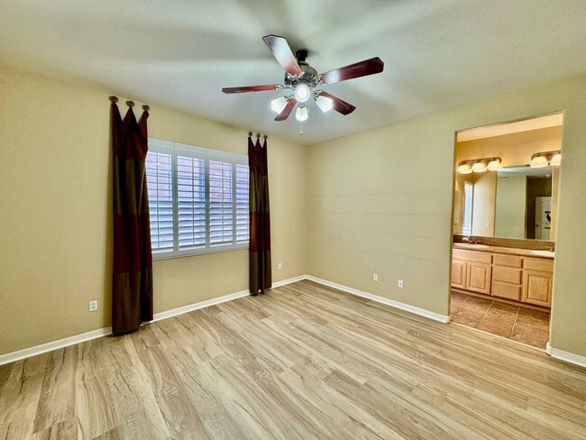 Building Photo - Located in a peaceful and well-maintained senior community, this spacious 3-bedroom, 3.5-bath Plu...