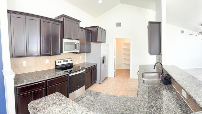 Building Photo - Charming well-maintained 4-bedroom, 2-bath home tucked in a quiet cul-de-sac just minutes from Fo...