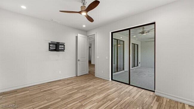 Building Photo - 8720 Cypress Lake Dr