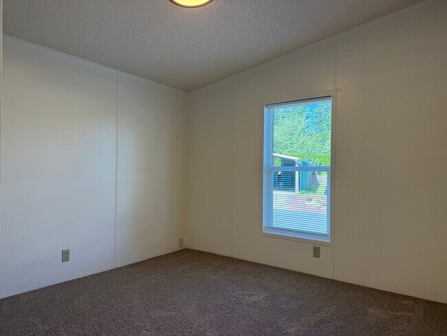 Building Photo - Welcome to Buxton Place – A Hidden Gem in Troutdale Offering Comfortable Homes, a Strong Sense of...