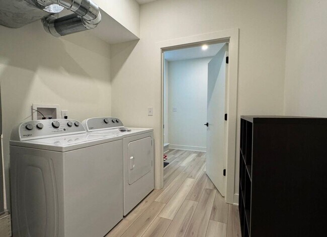 Building Photo - Vaulted Ceilings & Hardwood Floors in This Charming Indianapolis L