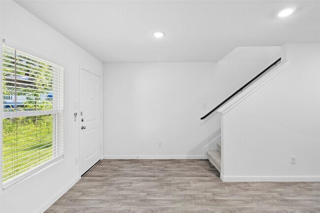 Building Photo - For lease in the sought-after Cedar Point community, this delightful home boasts 1,065 square fee...