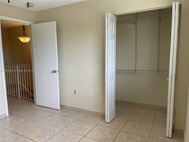 Building Photo - 7935 W 30th Ct