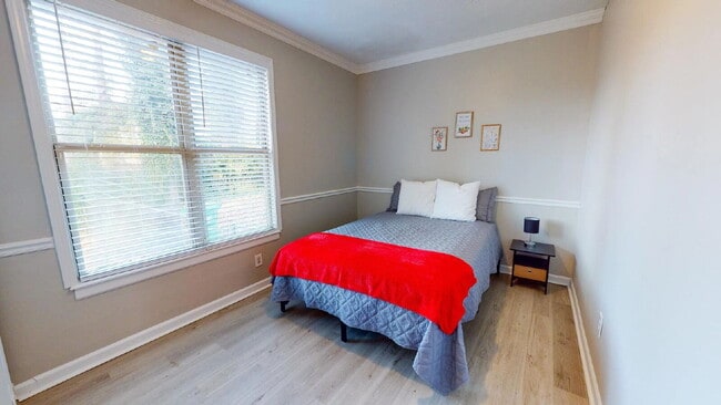 Building Photo - THE UNION GROVE | Gorgeous renovated home in Lithonia featuring large common areas, a spacious ki...