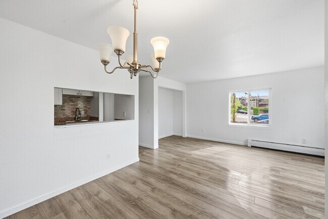 Building Photo - $1,440.95 with $300 Off the first month's rent,  2 Beds - 1 Bath, Condo in Denver with Granite Co...